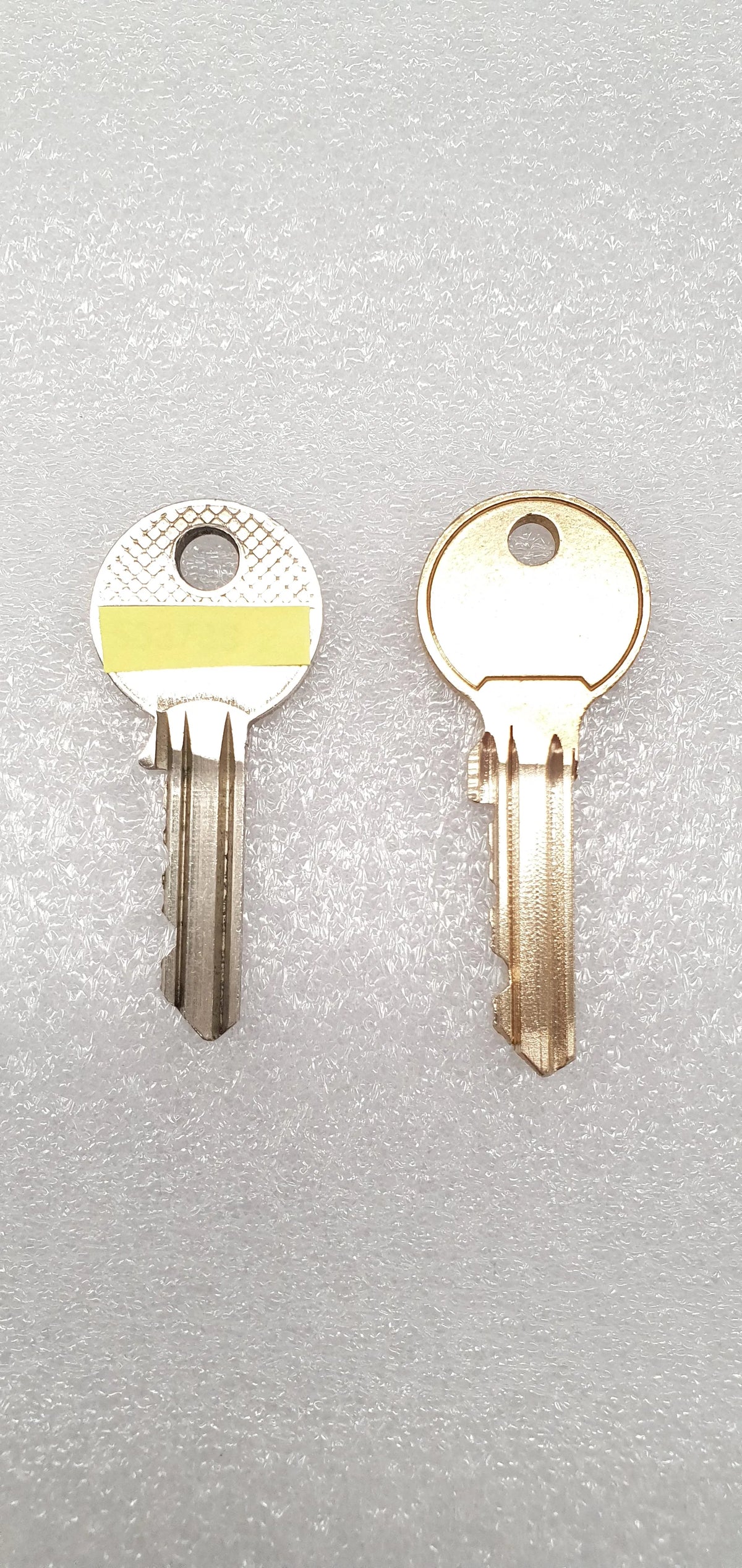 Sicherheitsschlüssel: Original und Kopie aus Messing