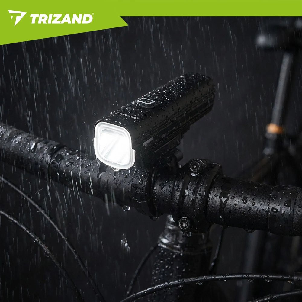 Frontleuchte am Fahrradlenker im Regen